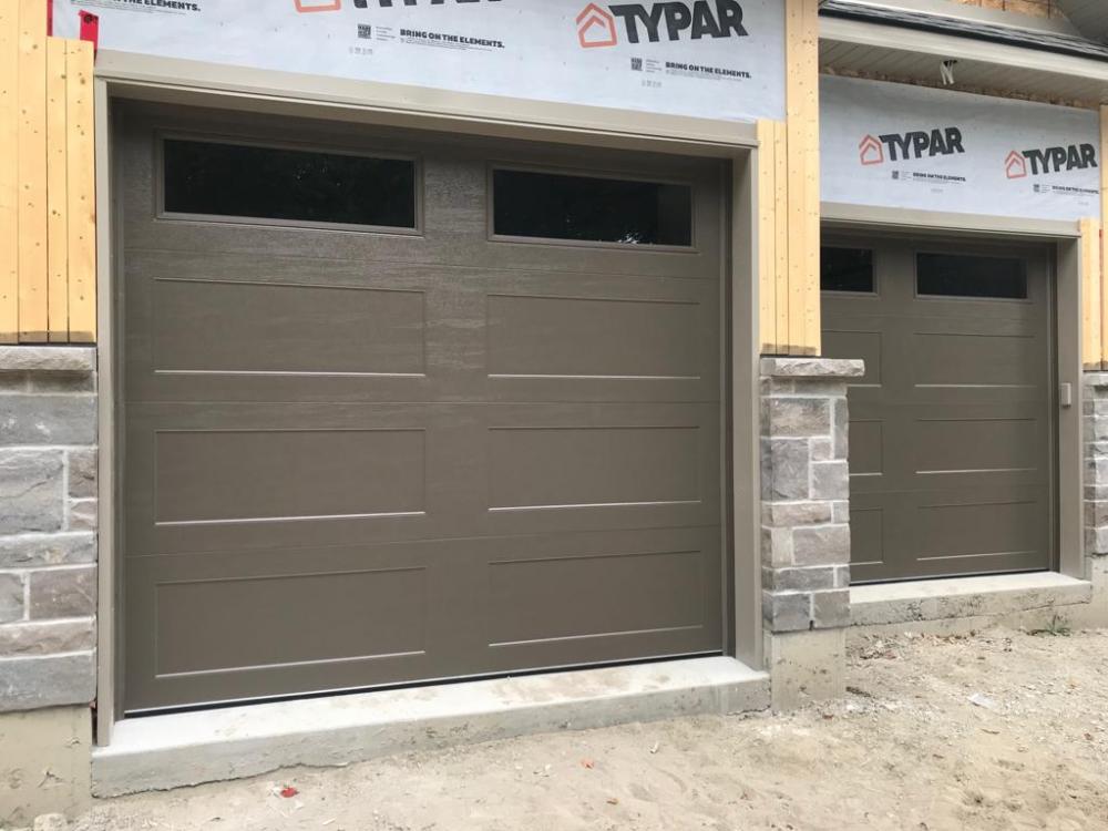 Brand new 9x8 bronze ranch smooth with clear windows 